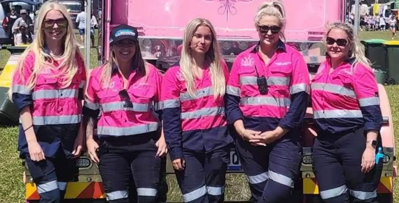 The Crown Traffic Services crew in pink and navy hi-vis